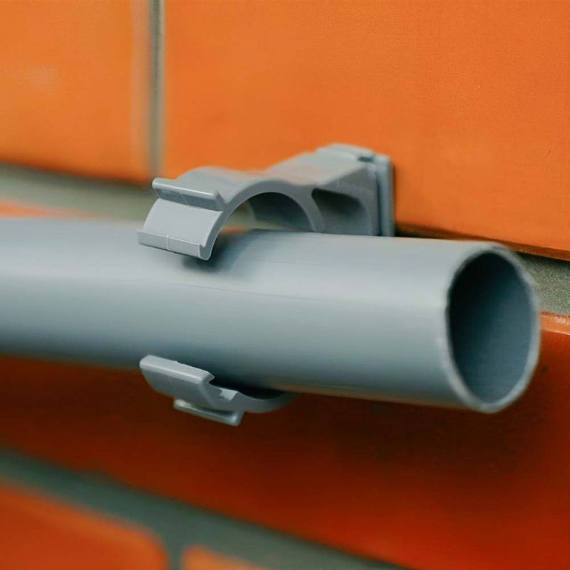 Abraçadeira PVC com Bucha 1" Cinza Tramontina